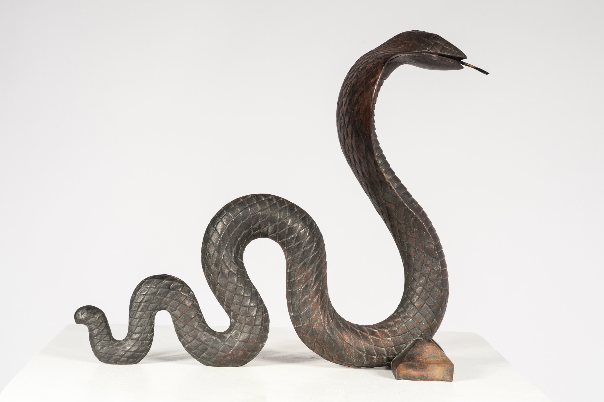 Pair of cobra andirons by Edgar Brandt