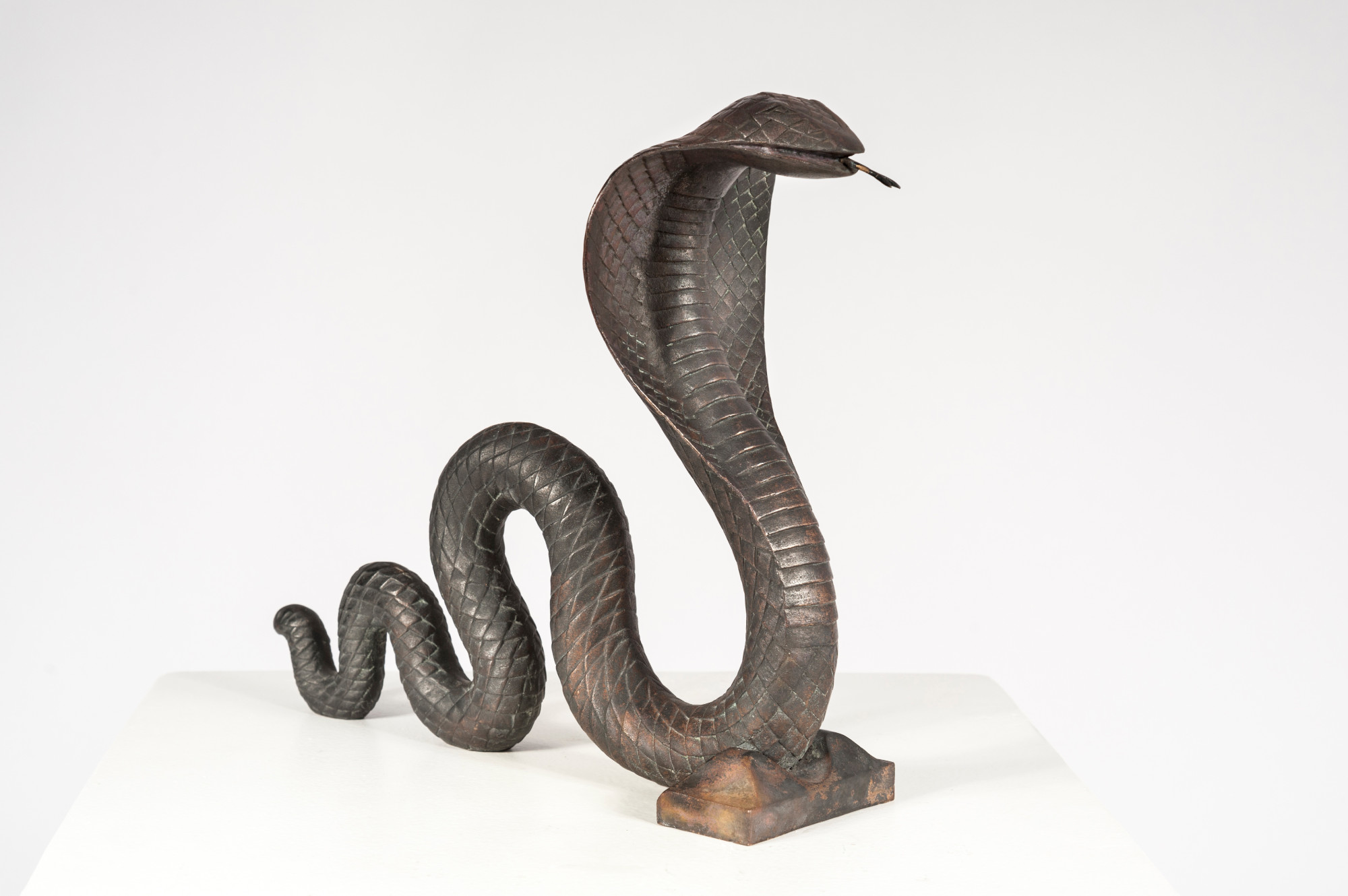 Pair of cobra andirons by Edgar Brandt